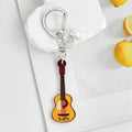 Guitar Shaped Charm Keychain With Star And Flower Pendants view 8