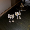Silver Tone Crystal Bow Drop Earrings Or Matching Necklace view 6