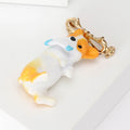 Orange And White Dog Brooch With Bow With Polished Metal Detail view 4