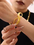 Figure Eight Curve Clasp Bangles Polished Gold and Steel Tone view 6