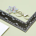 Mixed Small Crystal and Pearl Christmas Snowflake Keychains in Four Designs view 4