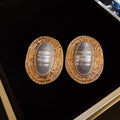 Ribbed Oval Frame Pearl Statement Stud Earrings in Gold and Silver view 6