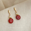 Gold Tone Leaf Top White Pearl And Red Translucent Disc Stud Earrings view 3