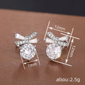 Silver Tone Bow Baguette and Round Clear CZ Stud Earrings view 4