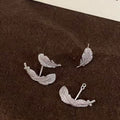 Crystal Double Leaf Stud Earrings With Polished Metal Tone Details view 3