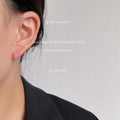 Silver Tone Daisy Flower Mini Hoop Huggie Earrings view 2