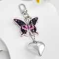 Acrylic Butterfly Charm Keychain With Cross Print And Heart Pendant view 3
