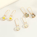 Gold Tone Round Clear Resin Flower Drop Earrings in Three Designs view 1