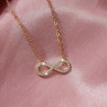 Gold Tone Clear Stone Infinity Pendant Necklace Jewelry view 1