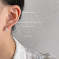 Gold Tone Clear Stone Bow And White Pearl Drop Stud Earrings view 3