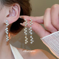 Silver Tone Graduated Crystal Linear Drop Earrings view 1