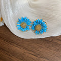 Blue Woven Daisy Stud Earrings With Gold Tone Centers view 6