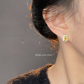 Silver Tone Yellow Rectangle Stone Clear Halo Stud Earrings view 2