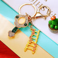 Gold Tone Ladder and Ruyi Keychains with Crystal Heart Details view 3