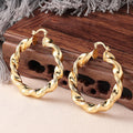 Gold Tone Twisted Open Hoop Earrings With Sculpted Texture view 5