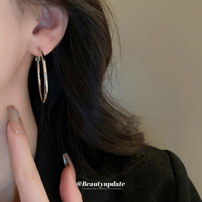 Geometric Hoop Earrings in Twenty-Six Six Colors and Shapes