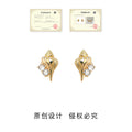 Gold Tone Conch Shell And Clear Stone Earrings In Stud And Clip Styles view 4
