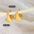 Geometric Twisted Hoop Earrings Gold And Steel Tone Pair view 2