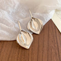 Open Leaf Dangle Stud Earrings in Gold and Silver Tone view 7