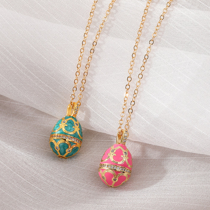 Gold Tone Ornate Egg Pendant Necklaces in Pink and Green