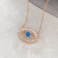 Blue Eye Pendant Necklace with Clear Halo in Gold Tone view 2