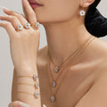 Gold Tone Clear Five-Petal Flower Jewelry Set Pieces view 3