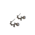 Pair of Metal Tone Pink Pearl Bow Stud Earrings with Clear Crystals view 5
