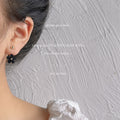 Gold Acrylic Flower Ear Jacket Earrings White Black Dual Wear view 3