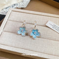 Blue Floral Drop Earrings with Shell Like Petal Tops view 4