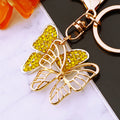Hollow Crystal Butterfly Keychains in White Fuchsia and Yellow view 8