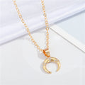 Gold Tone Crystal Double Horn Necklace and Huggie Earring Options view 4