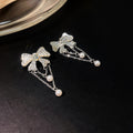 Silver Bow Chain Ear Clips and Teardrop Stud Earrings view 3