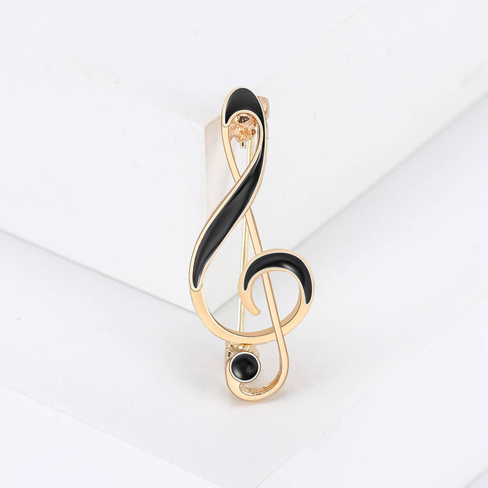 Black Enamel Treble Clef Brooch in Gold or Silver Tone