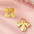 Sculpted Four Petal Flower Stud Earrings in Gold Tone view 3