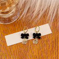 Black Velvet Bow Gold Fu Charm Huggie Hoop Earrings view 3