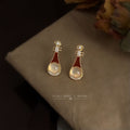 Gold Tone Burgundy Enamel Lute Shape White Cabochon Stud Earrings view 1