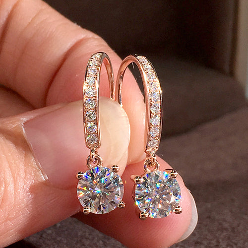 Rose gold tone round clear drop earrings with pavé lever hooks
