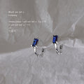 Silver Mini Huggie Hoop Earrings Blue Baguette Crystal view 2