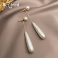 Gold Tone Pearl Like Long Teardrop Chain Stud Earrings view 4