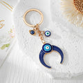Blue Evil Eye Hamsa, Heart, Butterfly and Moon Keychains view 5