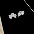 Pearl and Crystal Ear Clips in Four Floral and Bow Designs view 7