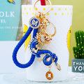 Mixed Jeweled Chinese Dragon Keychains in Fifty Eight Pictured Styles view 7