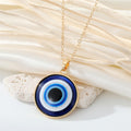 Round Blue Evil Eye Pendant Necklaces in Gold and Silver Tone Sizes view 12