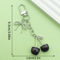 Butterfly Charm Keychains Featuring Black Cherry Across 31 Pictured Variations view 3