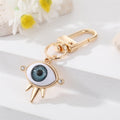 Gold Tone Sculpted Sun and Lash Realistic Eye Clip Keychains view 8
