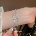 Crystal Pave Bow Tennis Bracelets Silver and Gold Tone view 3