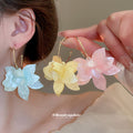 Gold Tone Hoop Earrings With Translucent Yellow Flower Drops view 1