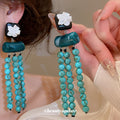 Turquoise Bead Tassel and Resin Drop Earrings in Two Designs view 3
