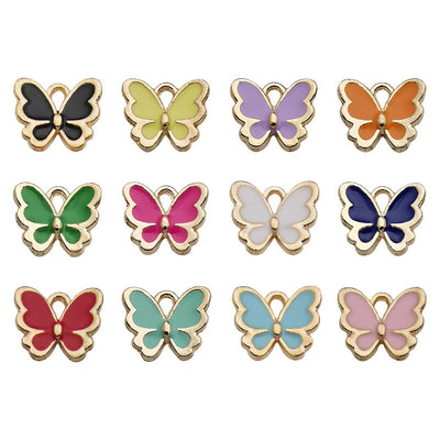 Colorful butterfly charms arranged on a light background