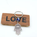 Silver Evil Eye Keychain With Butterfly Heart And Elephant Charm view 4